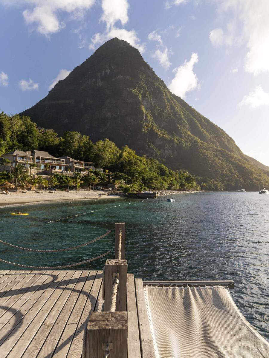 A Piton seen from the dock at Sugar Beach, a hammock in the foreground