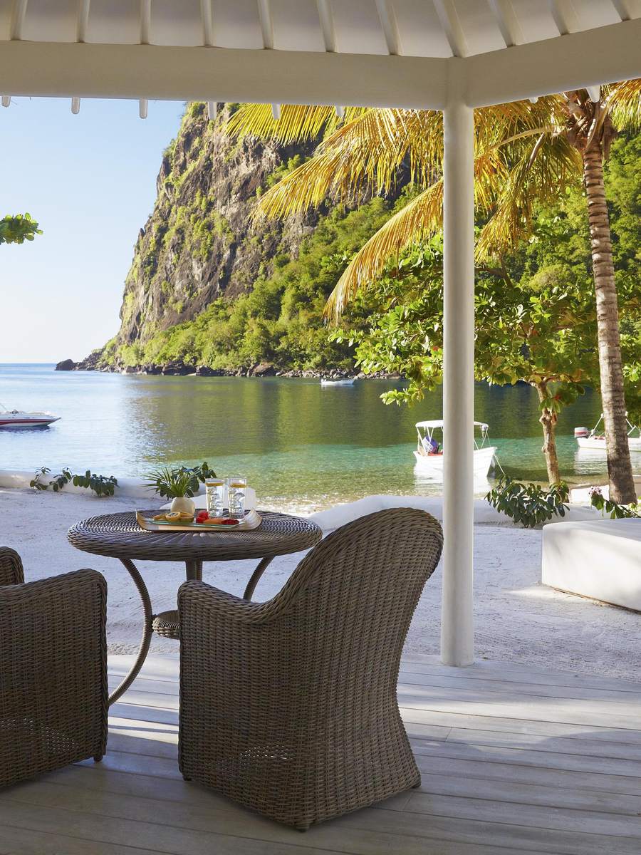 A beachfront bungalow terrace at Sugar Beach looking out to the bay