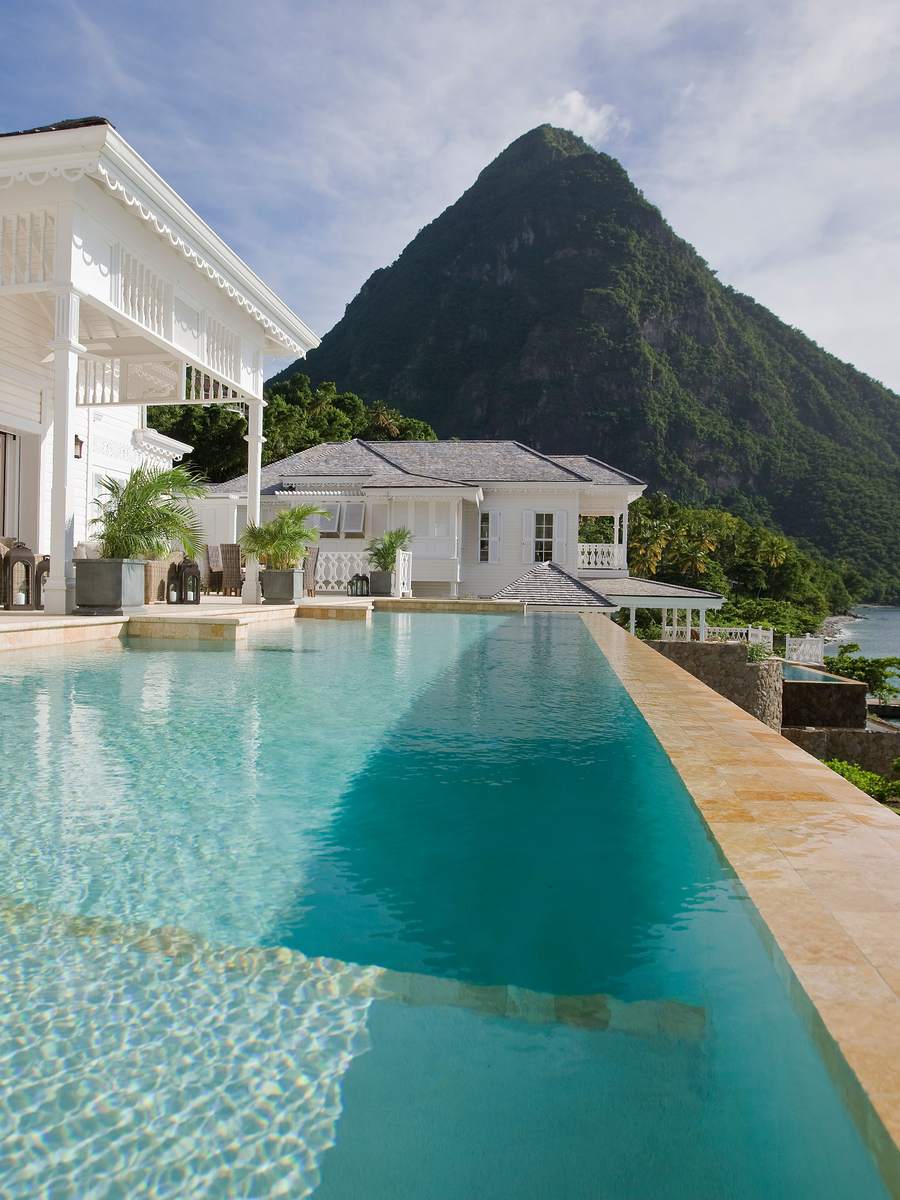 A villa infinity pool at Sugar Beach looking out at a Piton